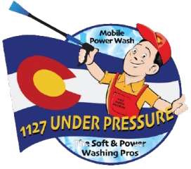 Logo for '1127 Under Pressure,' a mobile power washing service featuring a cartoon character holding a pressure washer, with the Colorado state flag in the background, and the tagline 'The Soft & Power Washing Pros.
